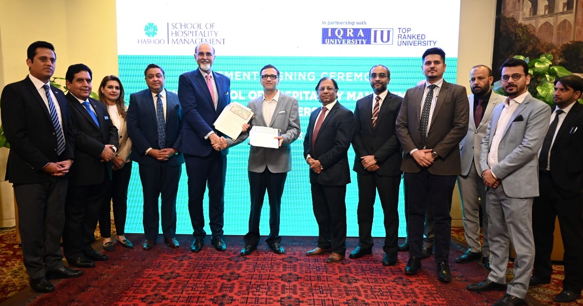 Key members of Hashoo School of Hospitality Management and Iqra University shaking hands and presenting agreement documents. Including in the picture are Mr. Haseeb Gardezi, Dr. Mirza Amin Ullah Haq, Mr. Naveed Lakhani, Dr. Zaki Rashidi, and Mr. Asad Warraich.