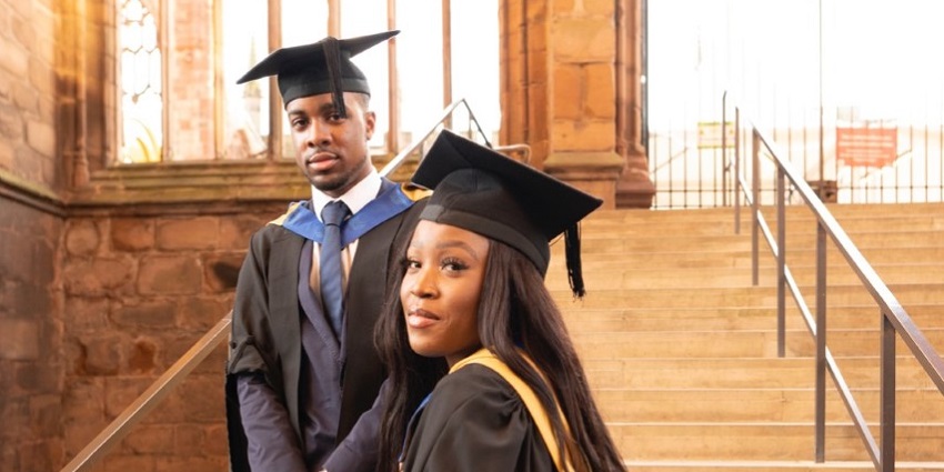 A male and female graduate of the CTH Level 6 Professional Diploma attending the Coventry University graduation ceremony.