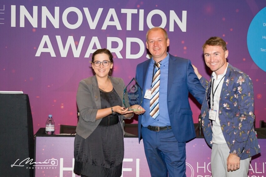 The Innovation Award being being presented to the winner at the Hotel & Resort Innovation Expo.